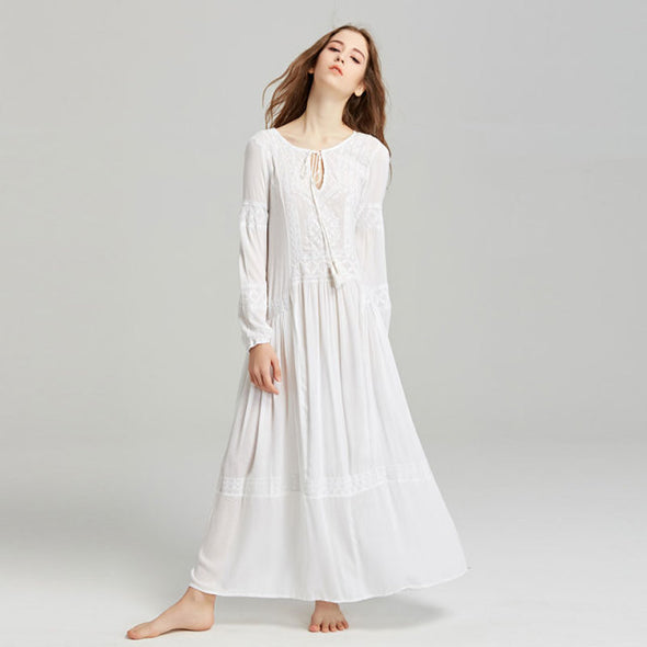 Summer new Europe and America travel Bohemian island holiday exquisite embroidery V collar fringe plain color loose dress